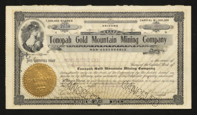 Certificate with black and gold ink shows intricate bordering, lettering, a company seal, signatures, cancel stamps, and a vignette of a woman