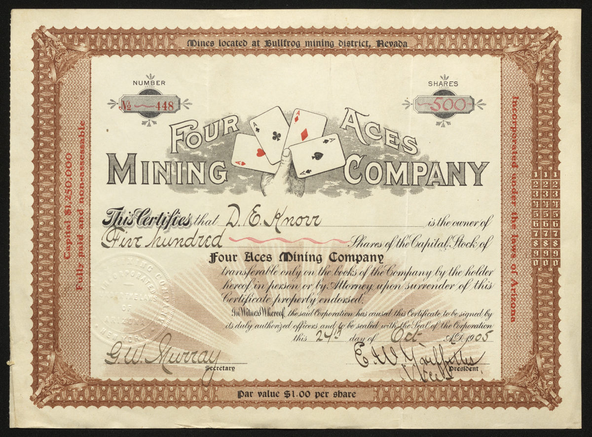 Certificate with black and red ink shows intricate bordering, lettering, signatures, company seal, and vignette of a hand holding a set of aces
