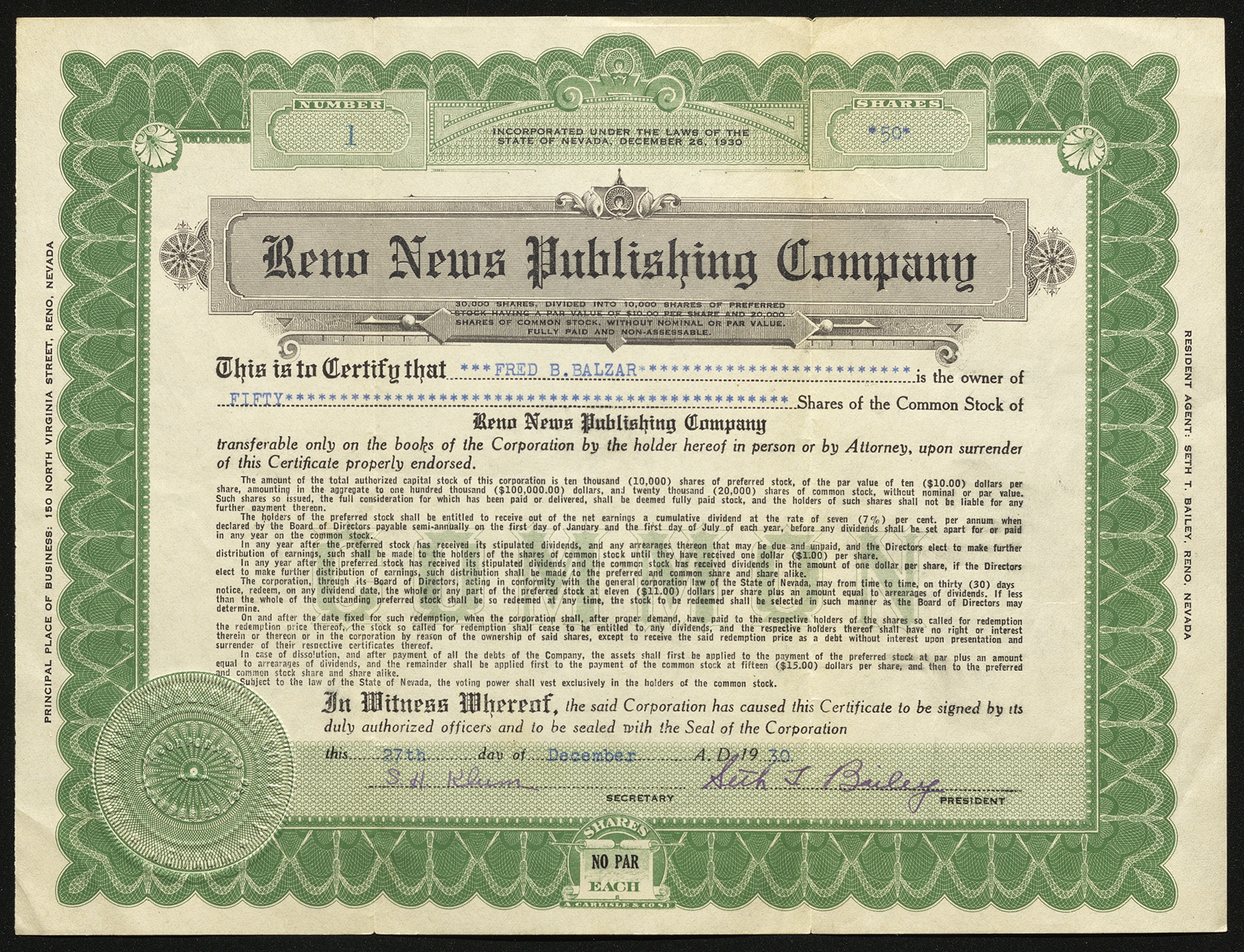 Certificate with black and green ink shows intricate borders, lettering, a company seal, and signatures