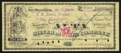 Certificate with black ink shows intricate borders, lettering, a vignette with quail in tall grass, a company insignia, and a red IRS stamp