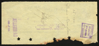 Back of certificate shows legal language including two signatures and a purple stamp showing dividends paid