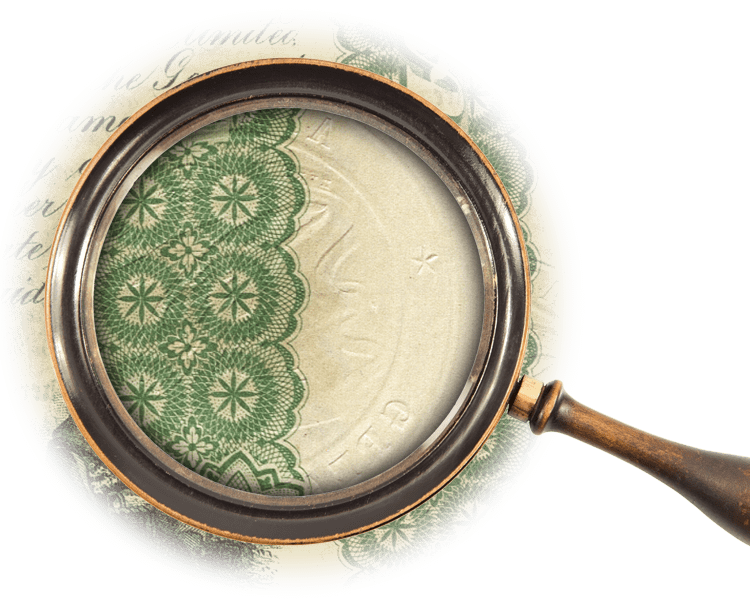 Magnifying glass over an embossed Great Seal of the State of Alabama